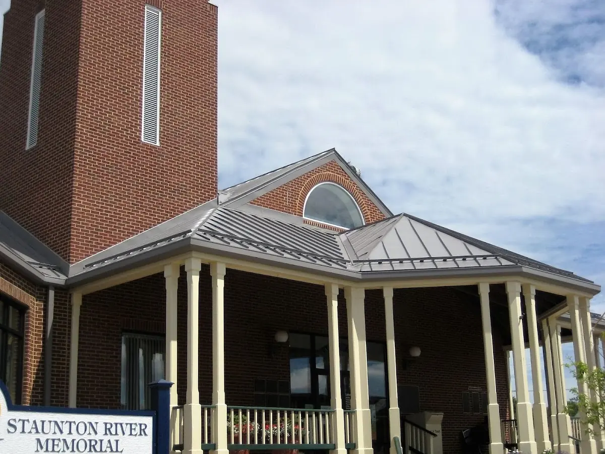 Skilled roofing craftsmen working on a residential roof in Braddock Heights